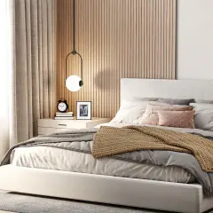 Gemütliches Schlafzimmer mit Holzakzenten an der wandfarbe hinter bett. Helle Bettwäsche und ein warmer Überwurf laden zum Entspannen ein.