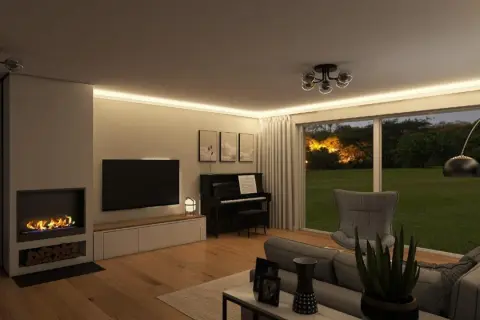 Gemütliche wohnidee wohnzimmer mit Kamin, Klavier und Blick ins Grüne. Einladende Atmosphäre durch indirekte Beleuchtung.