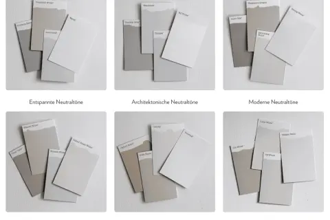Farbkarten zeigen verschiedene neutrale Wandfarben. Die Wirkung von Wandfarbe wird durch diese Nuancen verdeutlicht.