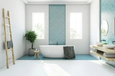 Modernes Badezimmer mit freistehender Wanne, Doppelwaschbecken und türkisfarbenen Mosaikfliesen. Tolle Badezimmer Ideen für ein stilvolles Zuhause.