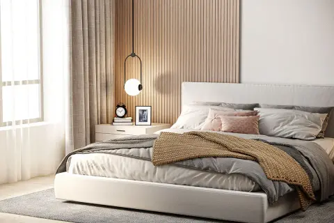 Gemütliches Schlafzimmer mit Holzakzenten an der wandfarbe hinter bett. Helle Bettwäsche und ein warmer Überwurf laden zum Entspannen ein.