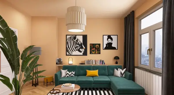 Gemütliches Wohnzimmer mit smaragdgrünem Sofa, auffälligen Kunstwerken und warmen Farbkombinationen an der Wand.