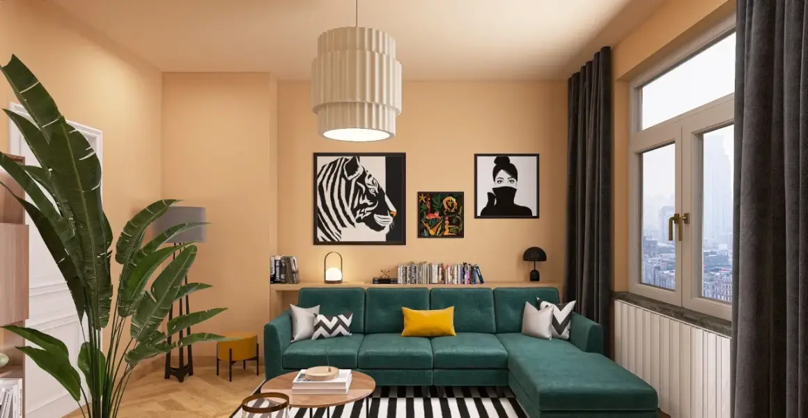 Gemütliches Wohnzimmer mit smaragdgrünem Sofa, auffälligen Kunstwerken und warmen Farbkombinationen an der Wand.