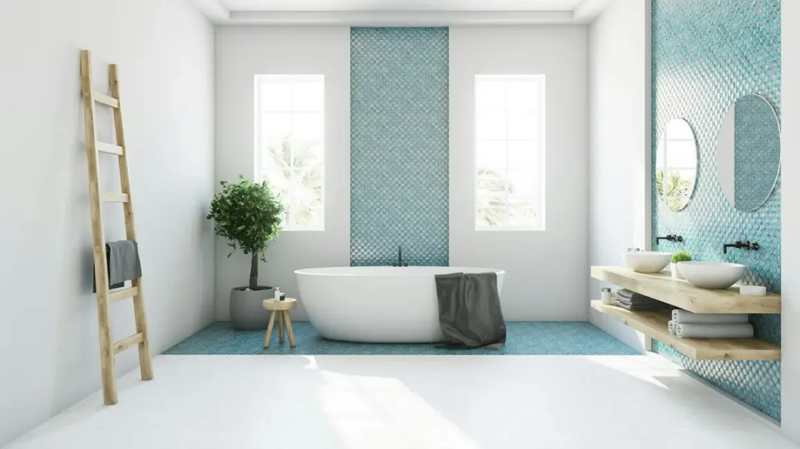 Modernes Badezimmer mit freistehender Wanne, Doppelwaschbecken und türkisfarbenen Mosaikfliesen. Tolle Badezimmer Ideen für ein stilvolles Zuhause.