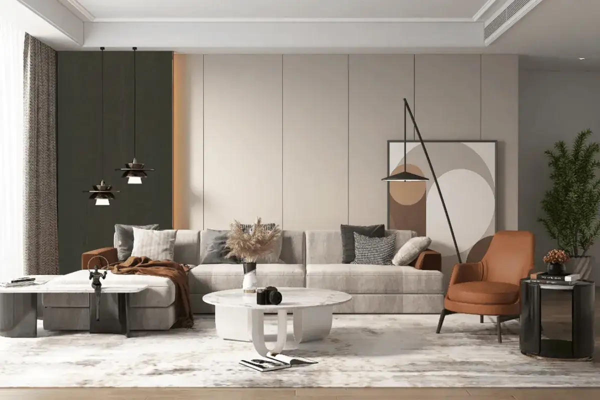 Moderne wandgestaltung hinter dem Sofa mit Akzenten in Dunkelgrün und Beige. Ein beiger Teppich und ein orangefarbener Sessel ergänzen das Bild.