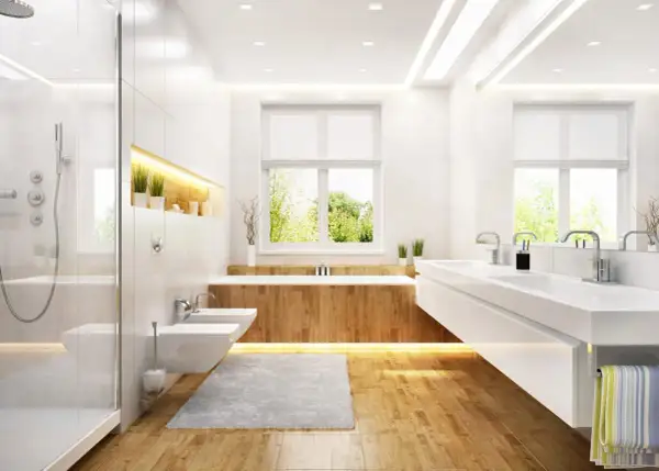 Moderne Badezimmer Ideen mit Holzboden: Dusche, Bidet, Doppelwaschbecken und Badewanne mit Holzverkleidung. Natürliche Beleuchtung durch Fenster.